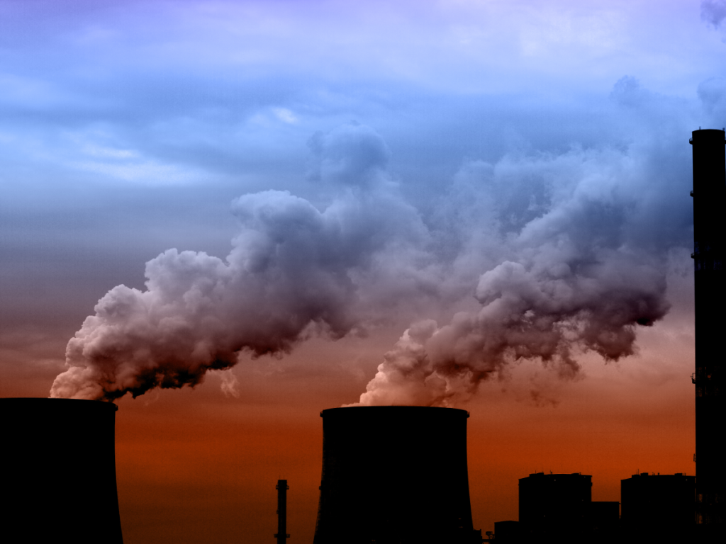 Clouds of emissions coming out of cooling towers