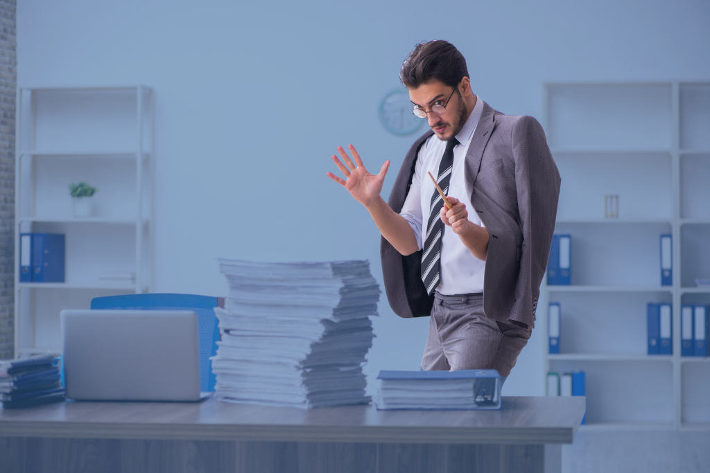 White-collar worker performs magic on a stack of templates.